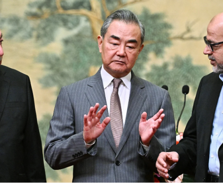 Mahmoud al-Aloul, Vice Chairman of the Central Committee of Fatah, China's Foreign Minister Wang Yi, and Mussa Abu Marzuk